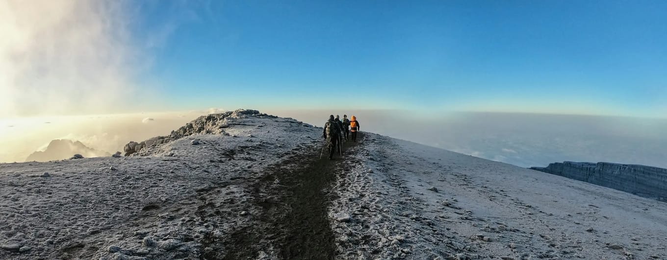 Climbers at the summit of Kilimanjaro in Tanzania