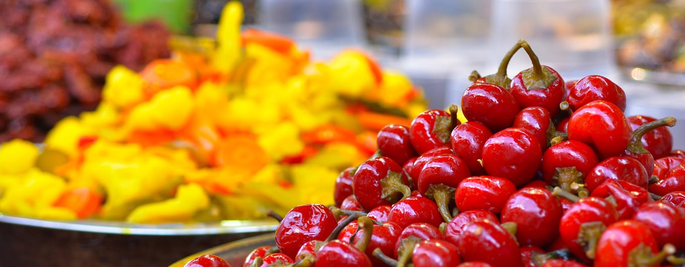 Pickled vegetables, tomatoes on display in food market in Tel Aviv, Israel