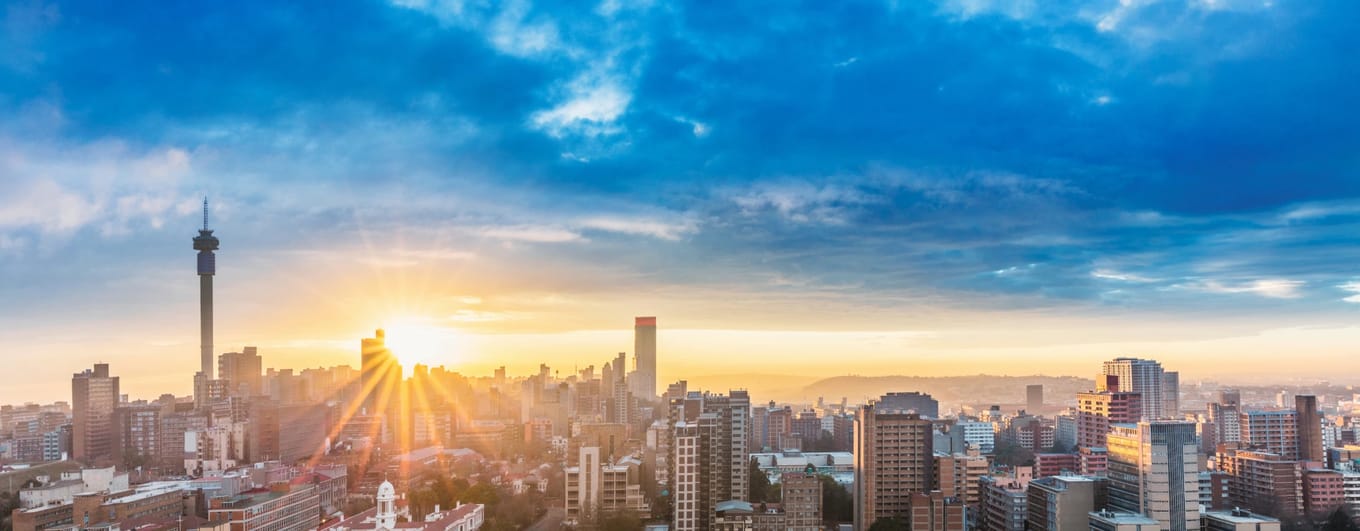 City skyline view with blue sky at sunset