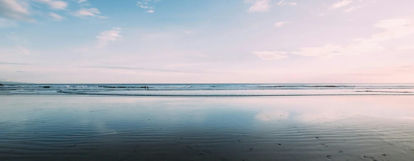 Landscape image of surfing beach in Nicaragua at dusk