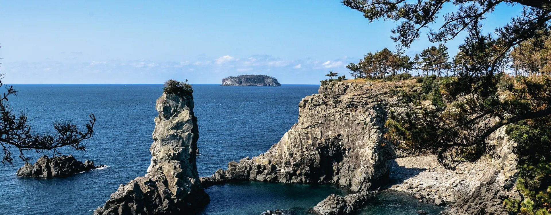 View from the rugged cliffs of an island out to sea in South Korea