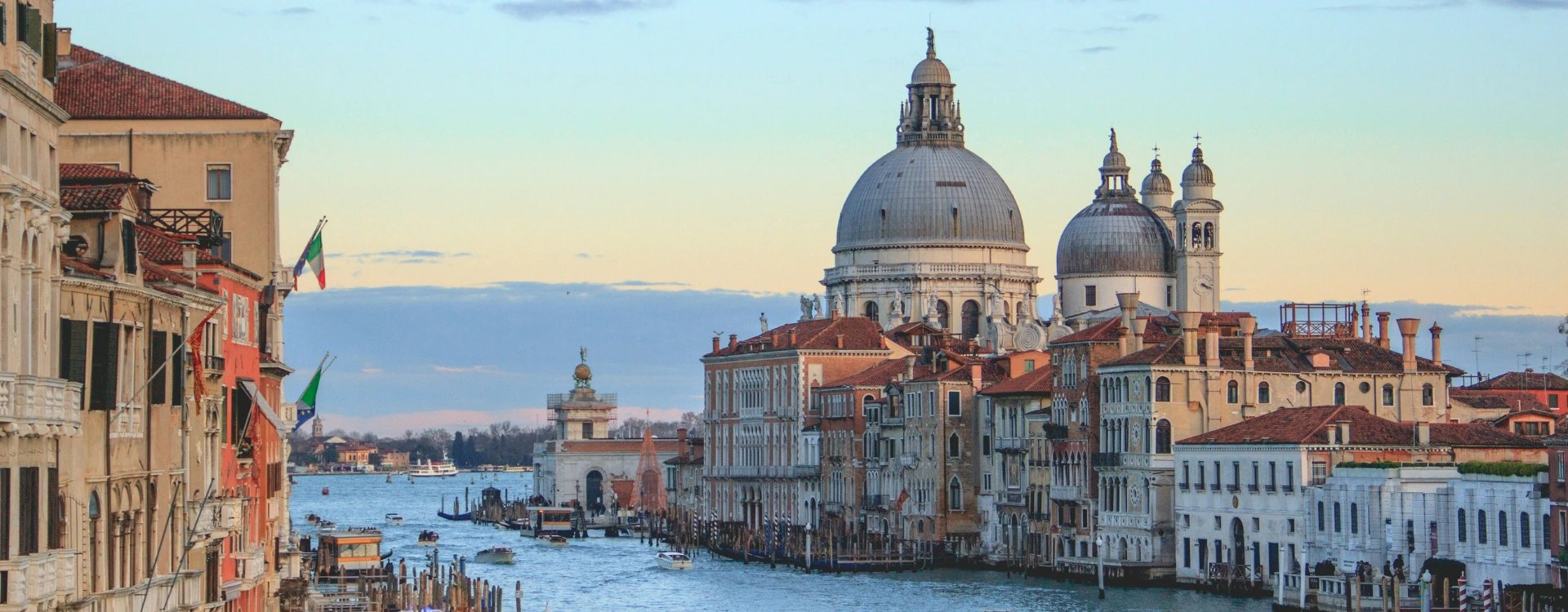 view of the Grand Canal with surrounding buildings and boats in Venice