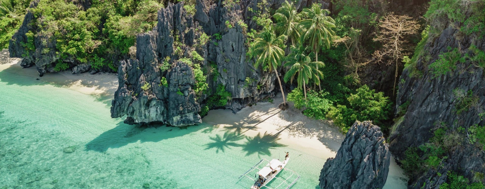 Boat in a bay of water in the Philippines