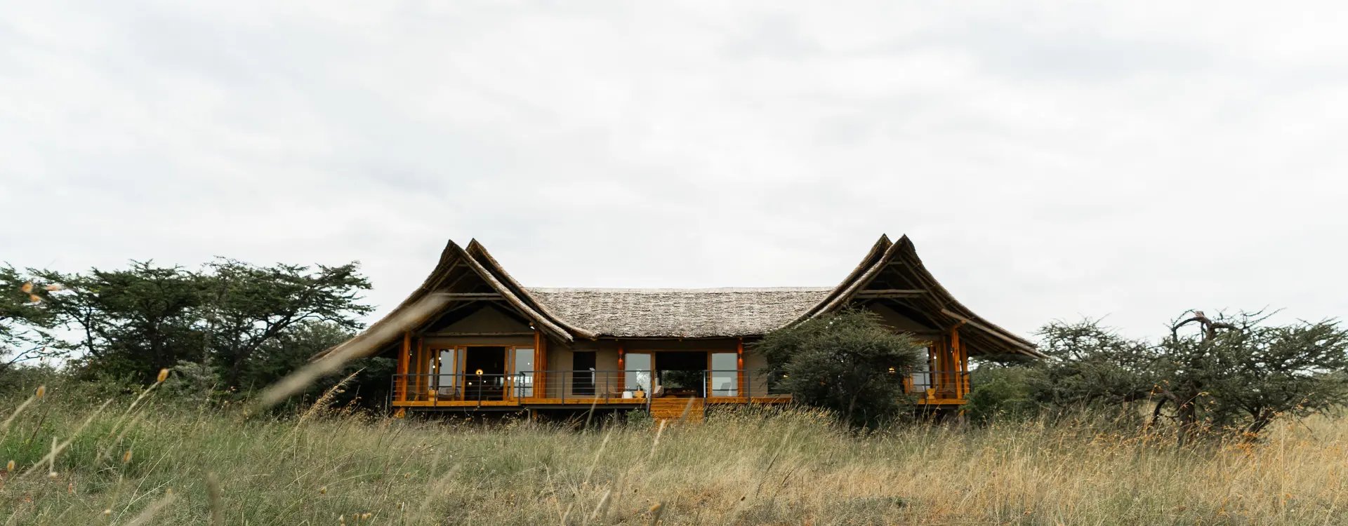 Exterior view of a safari camp in Kenya in the savannah grasslands