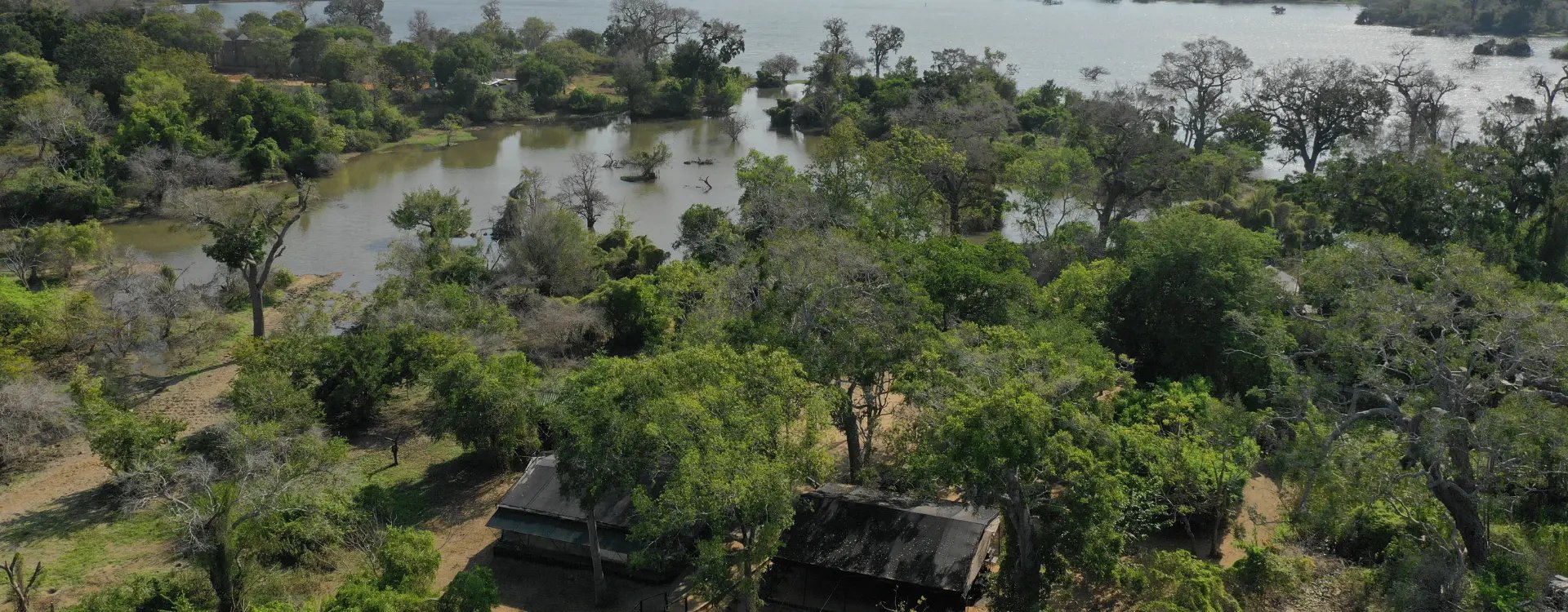 Aerial view of a luxury camp on the edge of a national park in Sri Lanka