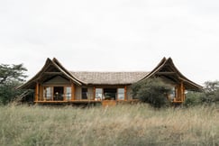 Exterior of a luxury safari camp in the Maasai Mara