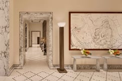 Marble walled reception of Bulgari Hotel Rome