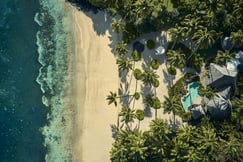 aerial view of beach and pool at como laucala island