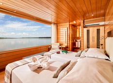 luxury twin suite with view of the amazon river onboard luxury cruise