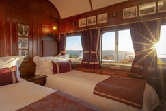 Twin bedroom in a railway carriage at Founders Lodge