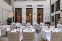 Outdoor dining area at luxury Venice hotel