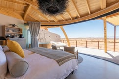 Bedroom with open air view of the landscape