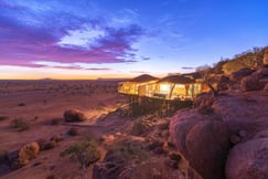 Aerial view at dusk of the Onduli Enclave and the Namibian landscape