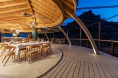 Open air dining area with views at dusk