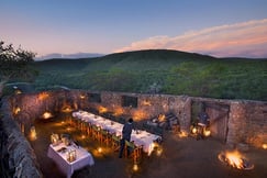 Outside dine setting at Kwandwe Great Fish River Lodge, South Africa