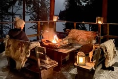 Outside dining setup at The Outpost Lodge, Finland