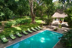 The pool area at Rivertrees Inn