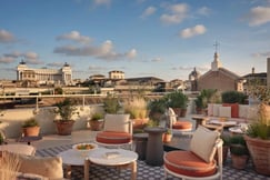 The rooftop terrace during the day with city views