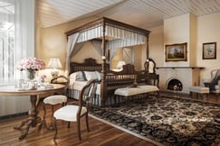 Four poster bed in one of the suites at Uga Halloowella in Sri Lanka