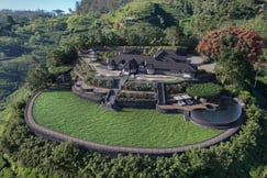 An aeriel view of the main colonial building and infinity pool at Uga Halloowella