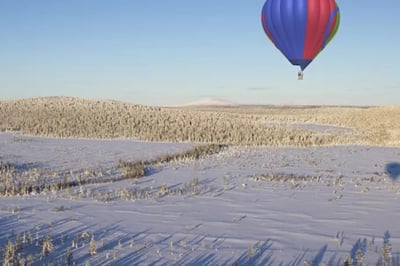 Hot Air Ballooning in Winter by The Outpost Lodge, Finland