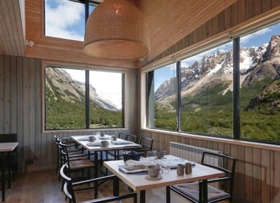 mountain views from dining room of a luxury lodge in patagonia