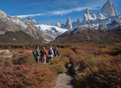 group of people hiking in the mountains of patagonia