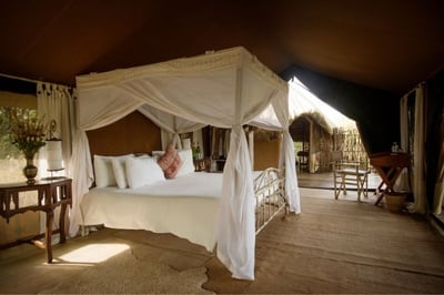 Four poster bed in tented camp