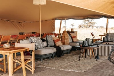 Seats with cushions in the lunge area at the mobile tented camp at Usawa Serengeti