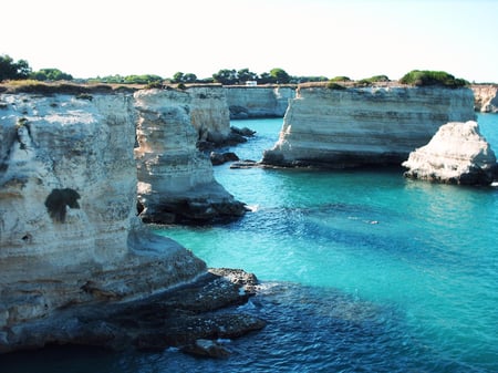 3 Scenic sight in Ostuni in a sunny summer day, Apulia (Puglia), southern Italy.