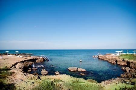 4 Scenic sight in Ostuni in a sunny summer day, Apulia (Puglia), southern Italy.