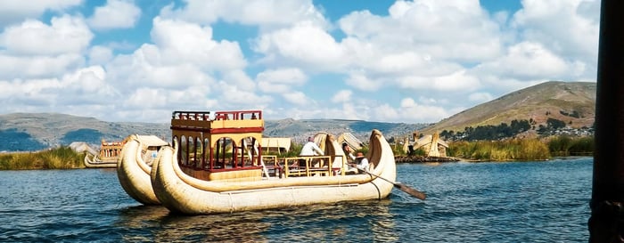 Boat sailing on Lake Titicaca in Peru